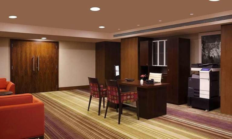 dedicated business center with PC, business desk, printer, and internet at Hilton Garden Inn Trivandrum.