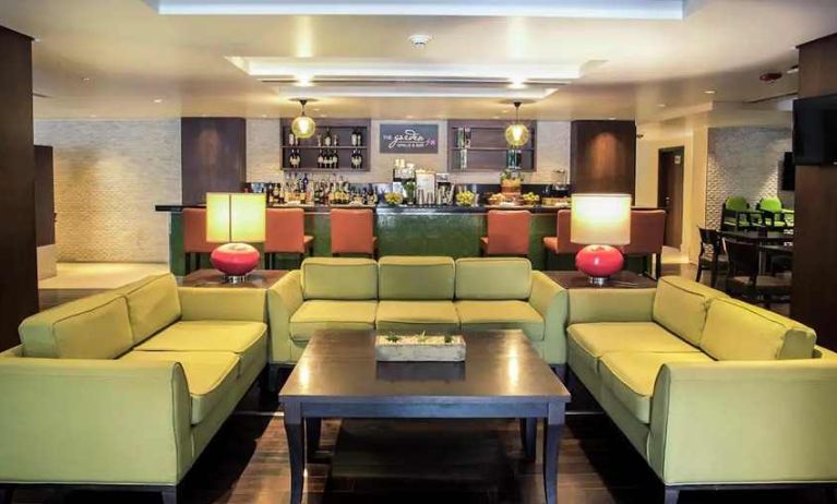 comfortable lobby and lounge area ideal for coworking at Hilton Garden Inn Trivandrum.