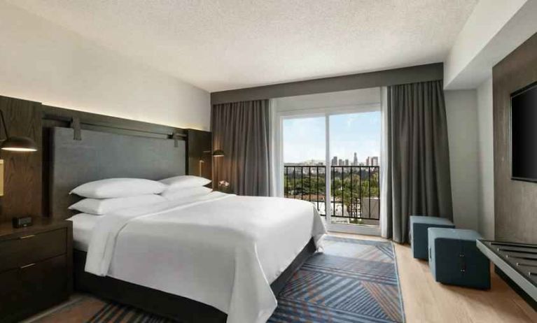 Comfortable king room at the Embassy Suites by Hilton Los Angeles Downey.