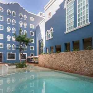 Outdoor pool at the Villa Mercedes Merida, Curio Collection by Hilton.