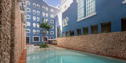 Outdoor pool at the Villa Mercedes Merida, Curio Collection by Hilton.