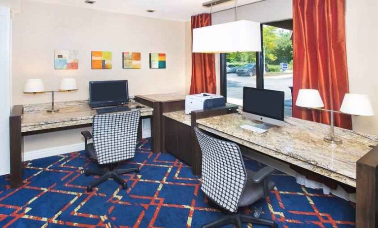 dedicated business center equipped with PCs, internet, printers, and work desk ideal for working remotely at Hampton Inn & Suites Annapolis.