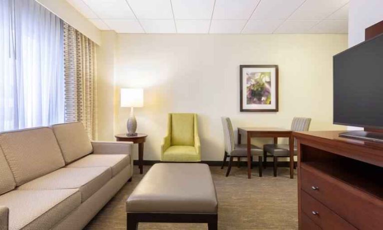 Living room perfect as workspace at the Doubletree by Hilton Houston Medical Center Hotel & Suites.