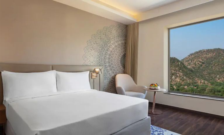 Hotel room with large window at the DoubleTree by Hilton Jaipur Amer.