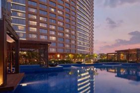 Relaxing outdoor pool at the Conrad Bengaluru.