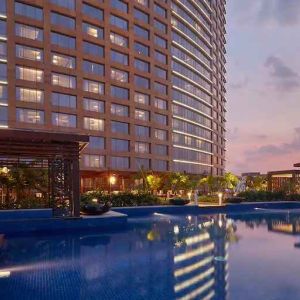 Relaxing outdoor pool at the Conrad Bengaluru.