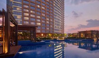 Relaxing outdoor pool at the Conrad Bengaluru.