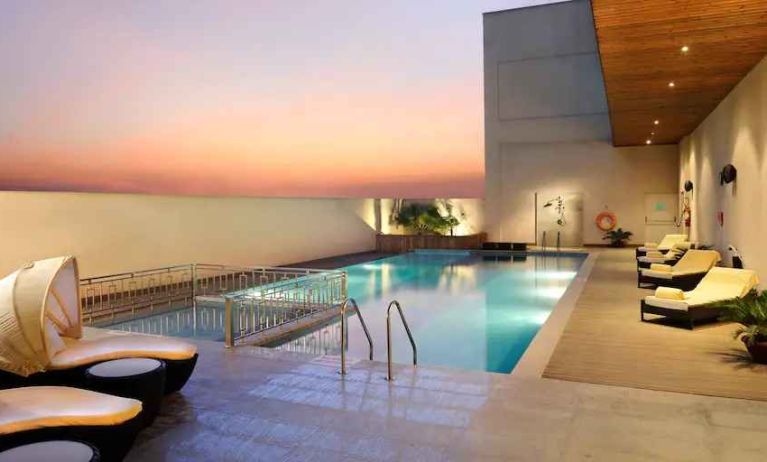 Relaxing outdoor pool at the DoubleTree by Hilton Hotel Gurgaon - New Delhi NCR.