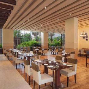 Dining area suitable for co-working at the DoubleTree by Hilton Gurugram Baani Square.