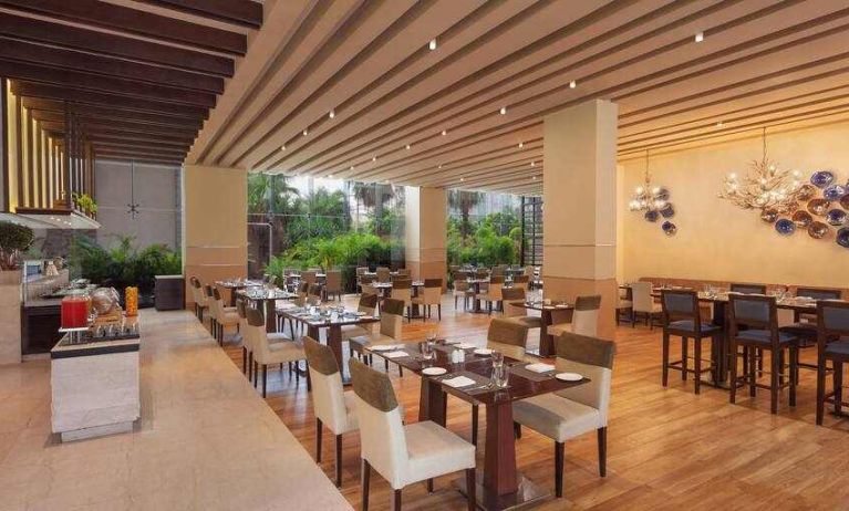 Dining area suitable for co-working at the DoubleTree by Hilton Gurugram Baani Square.