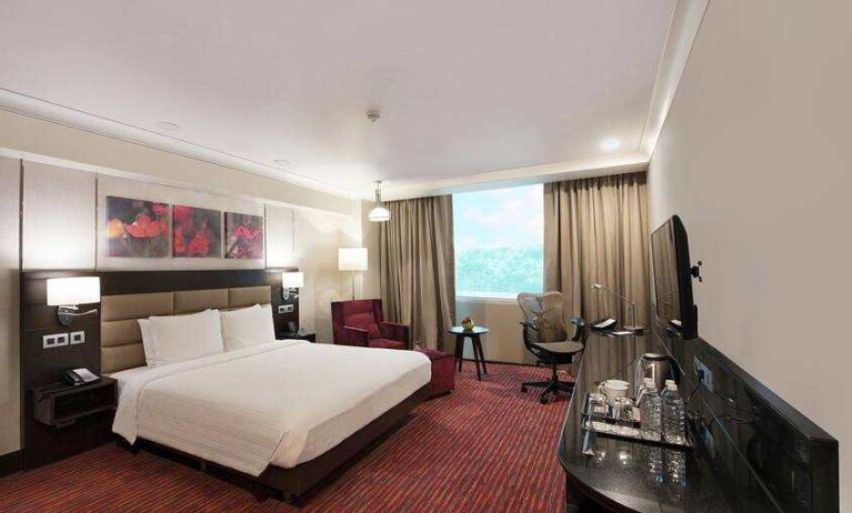 Spacious hotel room with working station at the Hilton Garden Inn New Delhi/Saket.