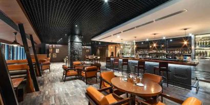 Dining area suitable for co-working at the Hilton Garden Inn New Delhi/Saket.