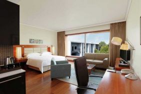 Spacious hotel room with working station at the Hilton Bangalore Embassy GolfLinks.