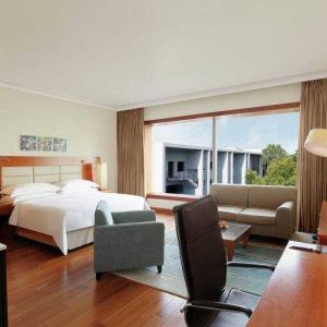 Spacious hotel room with working station at the Hilton Bangalore Embassy GolfLinks.