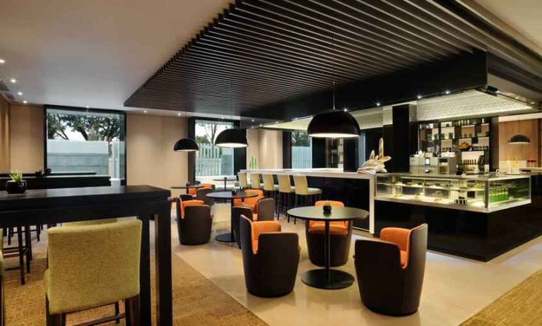 Dining area suitable for co-working at the Hilton Bangalore Embassy GolfLinks.