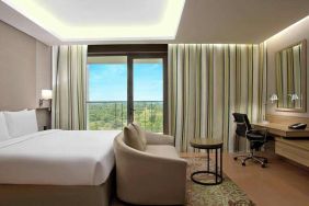 Comfortable hotel room at the DoubleTree Suites by Hilton Bangalore.