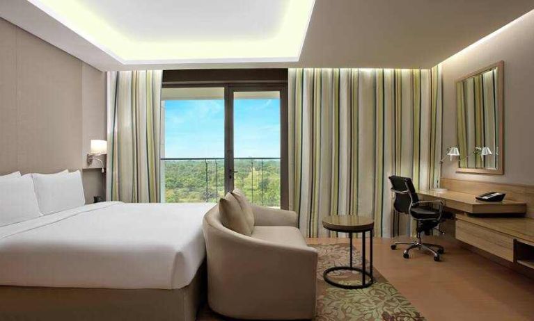 Comfortable hotel room at the DoubleTree Suites by Hilton Bangalore.