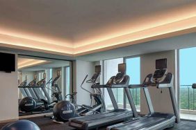 Fitness center at the DoubleTree Suites by Hilton Bangalore.