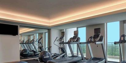 Fitness center at the DoubleTree Suites by Hilton Bangalore.