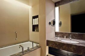 Guest bathroom at the DoubleTree Suites by Hilton Bangalore.