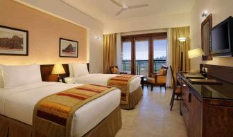 Twin room with desk at the DoubleTree by Hilton Goa - Arpora - Baga.