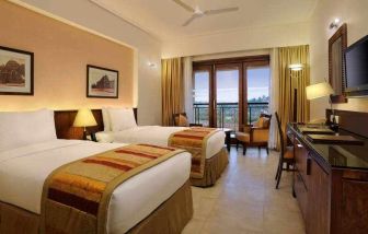 Twin room with desk at the DoubleTree by Hilton Goa - Arpora - Baga.