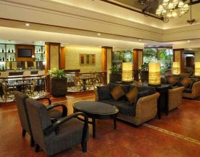 Seating area perfect as workspace at the DoubleTree by Hilton Goa - Arpora - Baga.
