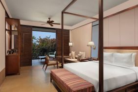 King bedroom with desk at the Hilton Goa Resort.