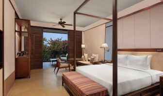 King bedroom with desk at the Hilton Goa Resort.