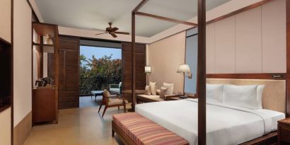 King bedroom with desk at the Hilton Goa Resort.