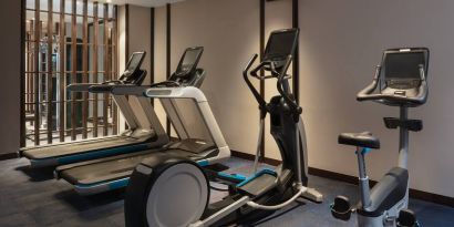 Gym with treadmills at the Hilton Goa Resort.