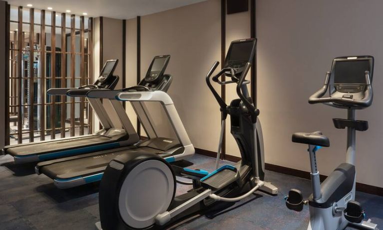 Gym with treadmills at the Hilton Goa Resort.