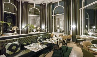 Dining area at the Hilton Brussels Grand Place .