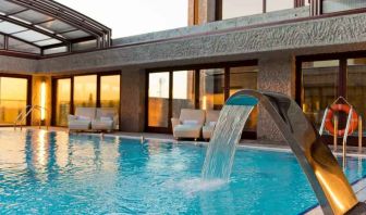 Beautiful outdoor pool area at the Hilton Madrid Airport.