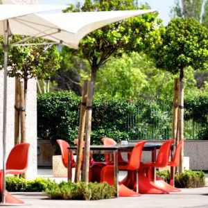 Outdoor patio perfect as workspace at the Hilton Madrid Airport.