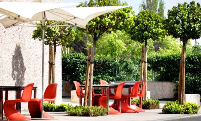 Outdoor patio perfect as workspace at the Hilton Madrid Airport.