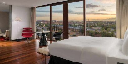 King bedroom with view at the Hilton Madrid Airport.