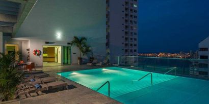 Relaxing outdoor pool at the Hampton by Hilton Cartagena.