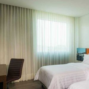 Comfortable twin room at the Hampton by Hilton - Valledupar.