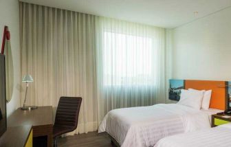 Comfortable twin room at the Hampton by Hilton - Valledupar.