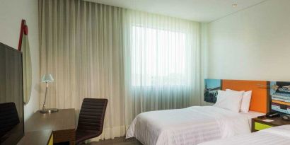 Comfortable twin room at the Hampton by Hilton - Valledupar.