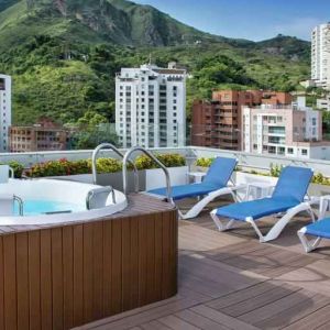 Outdoor terrace with pool at the Hampton by Hilton Cali.