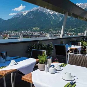 Outdoor terrace perfect as workspace at the Tivoli Innsbruck.