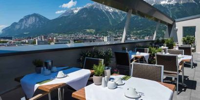 Outdoor terrace perfect as workspace at the Tivoli Innsbruck.