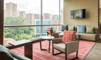 Bright hotel workspace at the Hampton by Hilton Medellin Antioquia.