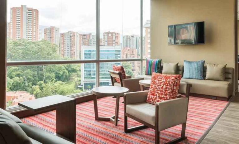 Bright hotel workspace at the Hampton by Hilton Medellin Antioquia.