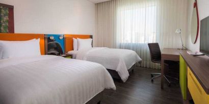 Twin room at the Hampton by Hilton Bucaramanga.