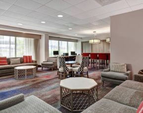 Lobby workspace at the Hampton Inn & Suites Alexandria Old Town Area South.