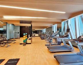 Fitness center at the AlRayyan Hotel Doha, Curio Collection by Hilton.