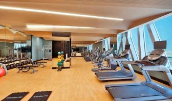 Fitness center at the AlRayyan Hotel Doha, Curio Collection by Hilton.